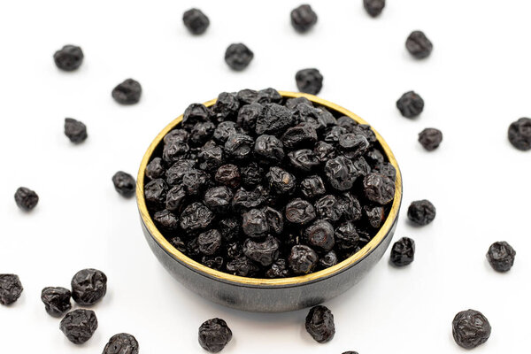 Dried blueberries isolated on a white background. Bulk blueberries. close up