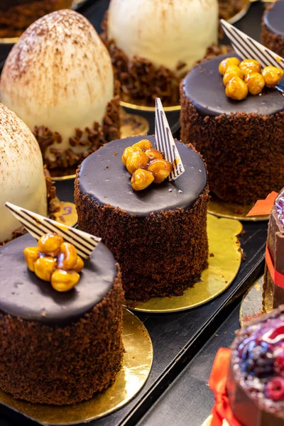 Types of cakes. Cakes on display at the patisserie counter. close up