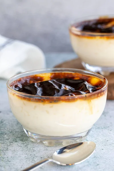 Rice pudding. Rice pudding dessert made of milk, sugar and rice on a stone background. Turkish cuisine delicacies. close up