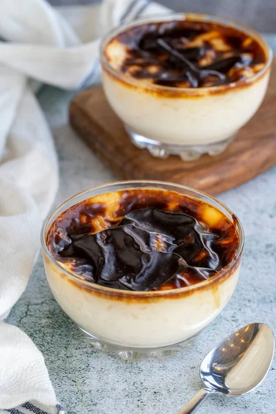 Rice pudding. Rice pudding dessert made of milk, sugar and rice on a stone background. Turkish cuisine delicacies. close up