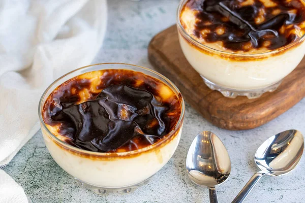 Rice pudding. Rice pudding dessert made of milk, sugar and rice on a stone background. Turkish cuisine delicacies. close up