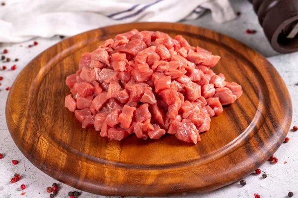 Cubed Meat Chopped Red Meat Wooden Serving Dish Stone Background —  Fotos de Stock