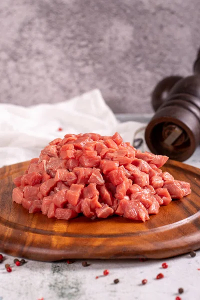 Cubed Meat Chopped Red Meat Wooden Serving Dish Stone Background — Stockfoto