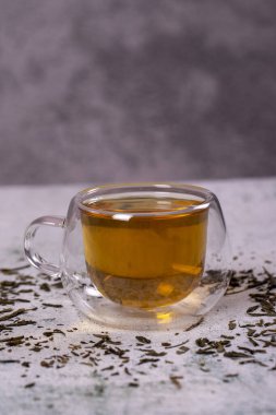 Green tea. Green tea on stone background. Healthy drinks. Herbal tea concept. close up