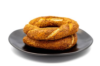 Sesame bagel. Turkish bagel isolated on white background. Bakery products. close up