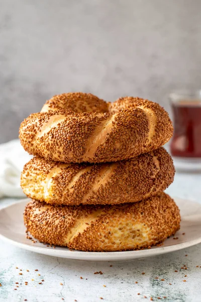 Turkish bagel or gevrek. Traditional flavors. Turkish street food circular bread, bagel with sesame. Close up