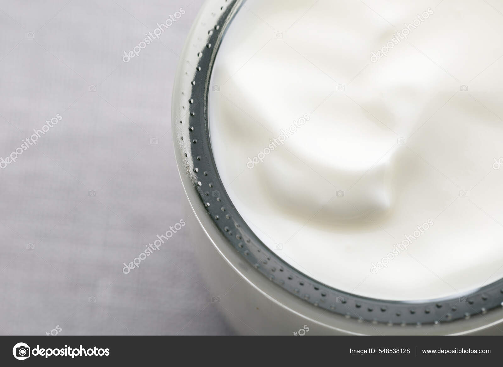 https://st.depositphotos.com/63881176/54853/i/1600/depositphotos_548538128-stock-photo-greek-yogurt-glass-jar-close.jpg