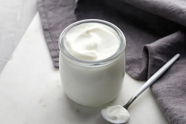 Empty White Nature Yogurt Glass Jar Marble Board Spoon Grey — Stock Photo, Image
