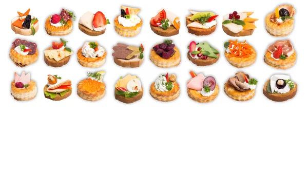 Many Different Canapes White Background — Stockfoto