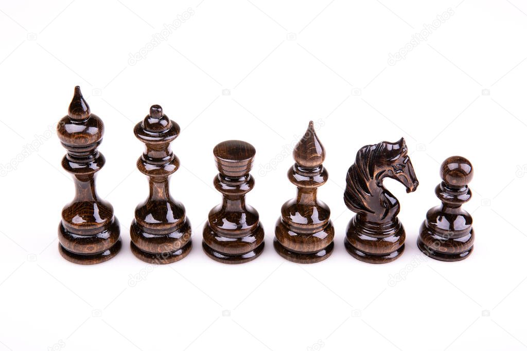 chess pieces and pawns isolated on a white background.