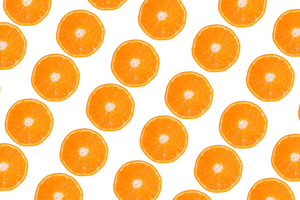top view orange fruit slices pattern. flat lay, overhead. isolated on white background. copy space