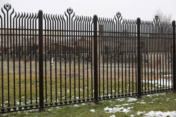 Metal Fence Row — стоковое фото