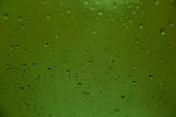 Rain Drops Green Glass Background Abstract Blur —  Fotos de Stock