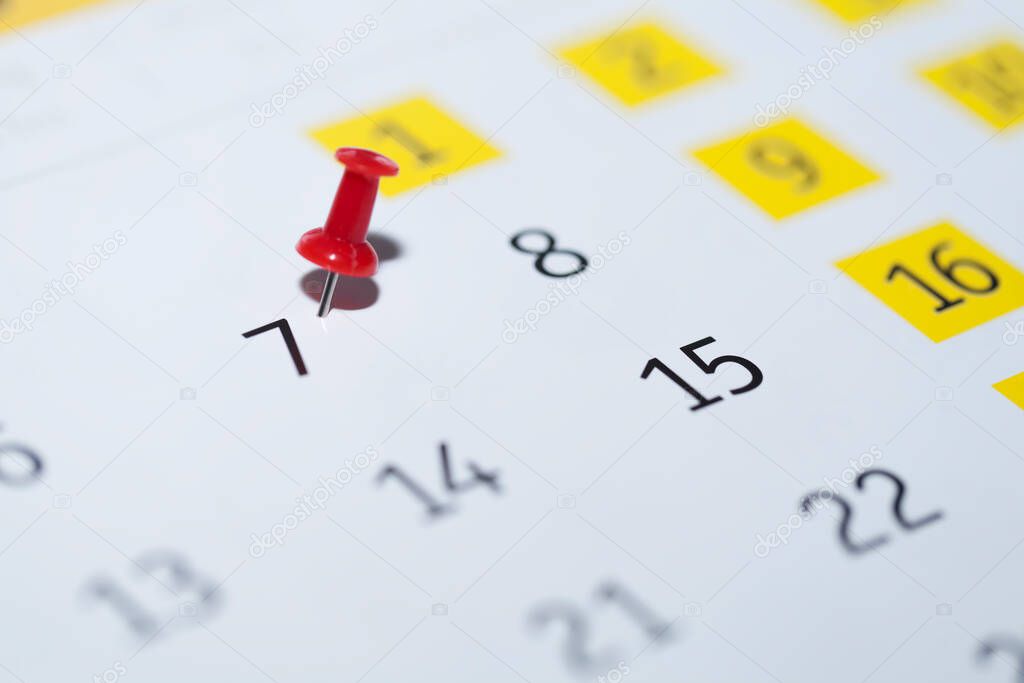 close-up of calendar on white background