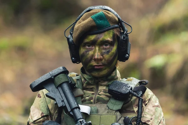 British armed forces lady soldier guarding pose