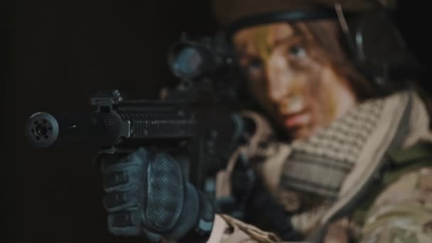 Vicious feminine armed fighter with rageful eyes — Stock Video
