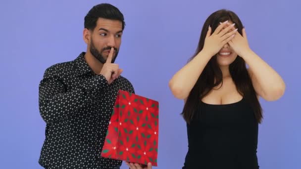 Excited Handsome Sexy Bearded Boyfriend Surprising His Girlfriend Red Gift — стоковое видео