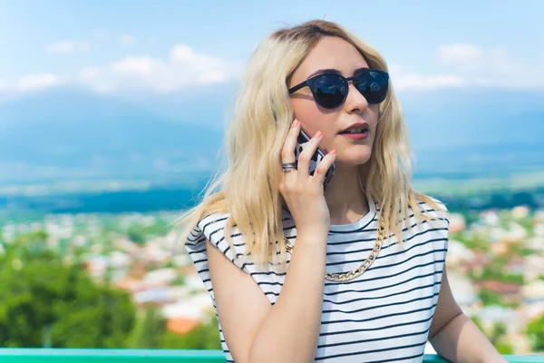 Blond Caucasian Girl Sunglasses Talking Phone Medium Closeup Outdoor High — Stock Photo, Image