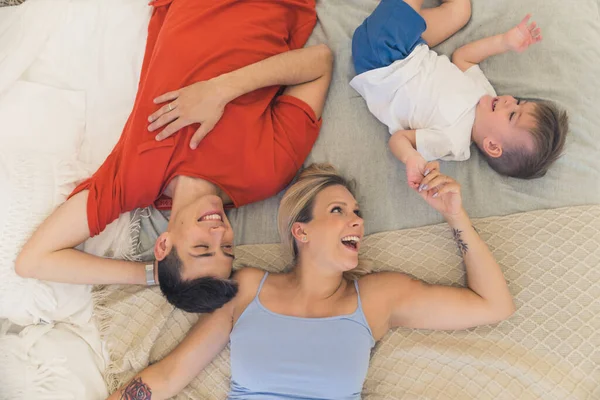 Young Family Having Fun Laughing Ticking Each Other Curious Little — Stok fotoğraf