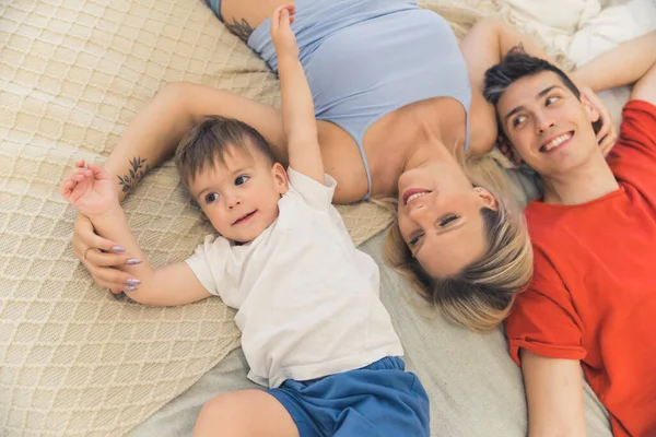 Cute Family Three Mother Father Son Laying Together Bed Backs — Stock fotografie