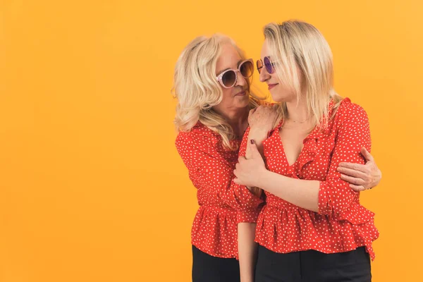 Studio Medium Shot Orange Background Two Caucasian Women 40S Laughing — Stock Fotó
