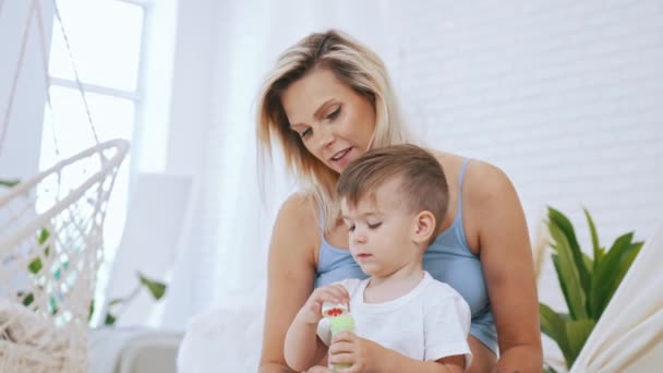 Little Boy Making Soap Bubles Mother Home Medium Closeup Mother — Stok Video