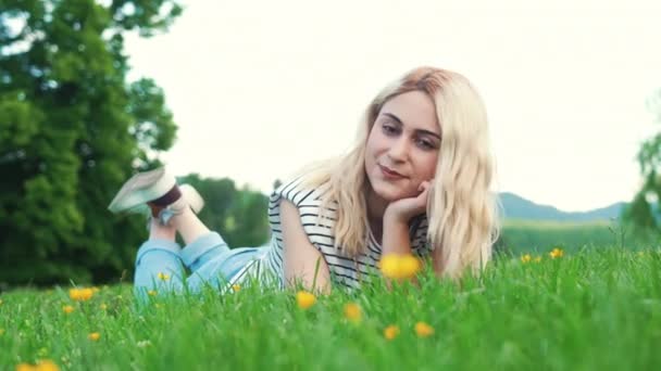 Blonde European Girl Lying Grass Outdoor Full Shot High Quality — Vídeo de Stock