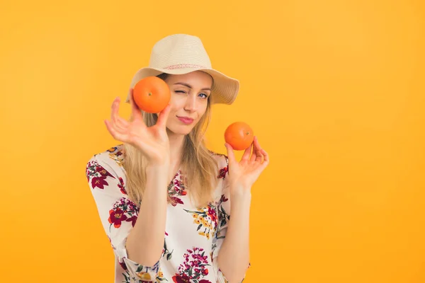 Pretty Caucasian Blond Young Girl Blinking Camera While Showing Two —  Fotos de Stock