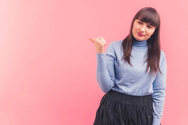 White Brunette Woman Uncertain Expression Wearing Blue Turtleneck Looking Pointing — 图库照片