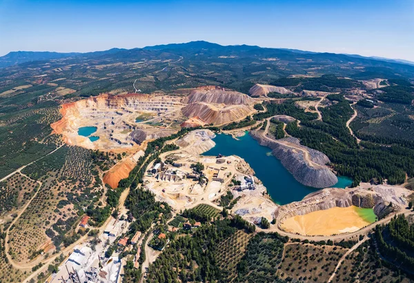 Human impact on the natural environment. Aerial view of an open-mine in Greece. High quality photo