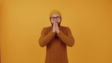 surprised man covering his face with his palms. High quality 4k footage