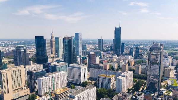 7.22.2022 Warsaw, Poland. Summertime in Warsaw. Skyline perspective of neomodern skylines - the highest Varso - and social realism representative - Palace of Culture and Science. High quality photo