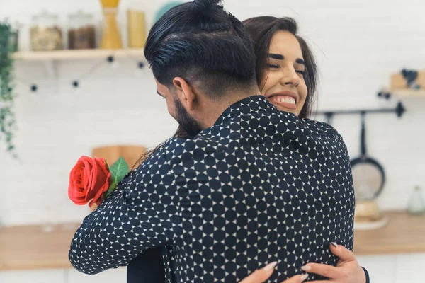 Boyfriend Surprising His Girlfriend Rose Valentines Day Young Couple Hugging — Foto de Stock