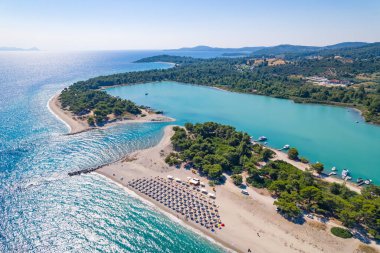 scenic drone shot of stunning Glarokavos Beach in Kassandra peninsula, Halkidiki, Greece. High quality photo