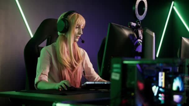 Young Gamer Girl Wearing Pink Clothes Headset Sitting Gaming Chair — Αρχείο Βίντεο