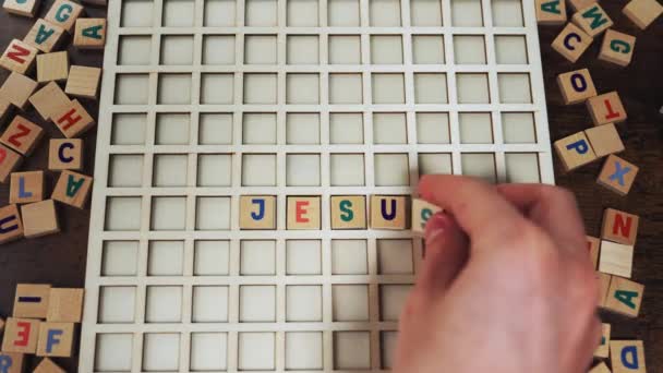 Jesus Christ Colourful Wooden Square Letters Creating Name Christian Son — Vídeo de Stock