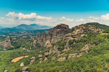 The famous Orthodox monastery on the top of Meteora rock formation in Greece. Summer travel visit. Education and knowledge about the world. High quality photo