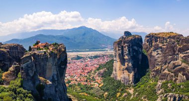 stunning aerial view of the famous monasteries on the tops of stone pillars in Meteora near Kalambaka town, Greece. High quality photo