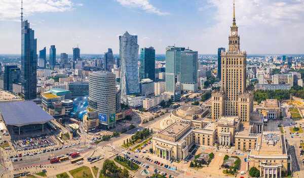 7.22.2022 Warsaw, Poland. Birds eye perspective concept. Contrast between socialist realism, stalinist architecture, and neomodern architecture. High quality photo