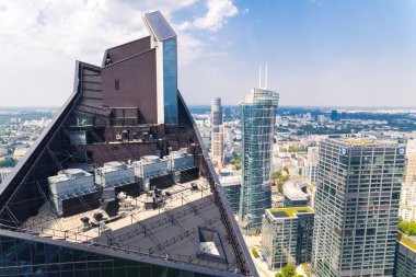 7.22.2022 Warsaw, Poland. The top of the roof of Skyliner skyscraper placed in Wola district. City development concept. Engineering and building. High quality photo