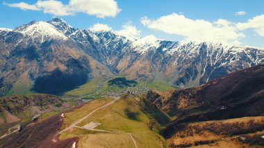 scenic drone shot of mountains in Kazbegi, Georgia. High quality photo
