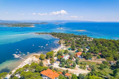 scenic drone shot of Karydi Beach in the sunny weather, Halkidiki Peninsula, Greece. High quality photo