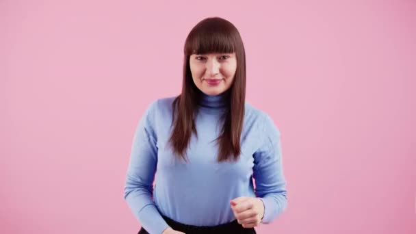 Excited Caucasian Brunette Woman Wearing Light Blue Turtleneck Smiling Wide — Stockvideo