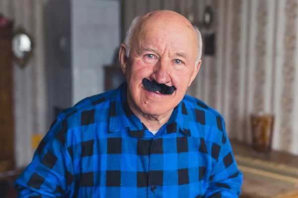 Funny Caucasian Old Single Man Holding Fake Black Mustache Smiling — Stock Photo, Image