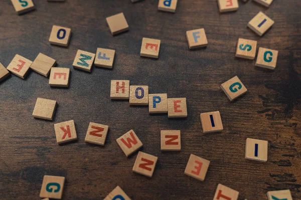 Symbolic Depiction Hope Use Colourful Wooden Square Letter Puzzles Dark — Photo