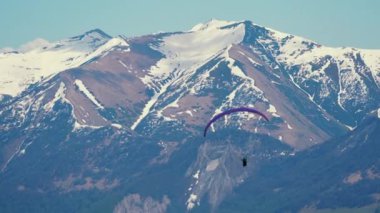 paragliding in the Caucasus mountains, Gudauri, Georgia. High quality 4k footage