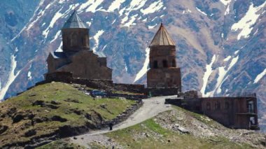 famous Gergeti Trinity church in Stepantsminda, Georgia. High quality 4k footage