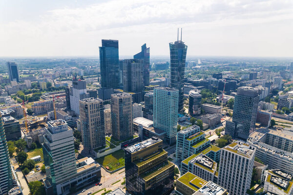 7.22.2022 Warsaw, Poland. Skyliner, Warsaw Unit, and Warsaw Spire seen from aerial perspective. Places to visit during a summer visit in Poland. High quality photo