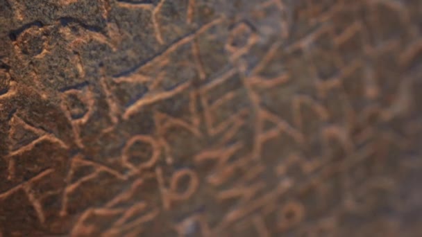 Ancient Greek Manuscript Engraved Dark Stone Wall Antique Inscription Written — Stock video