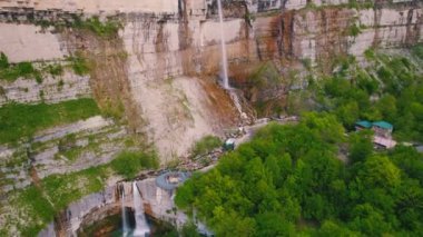 aerial shot of an enormous waterfall on cliff. High quality 4k footage